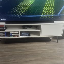 White TV Stand. Fits 65” TV