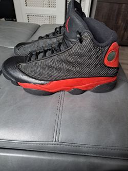 Black and top red jordan 13s