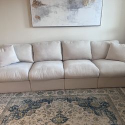 Four Seater Cream Couches With 2 Ottoman 