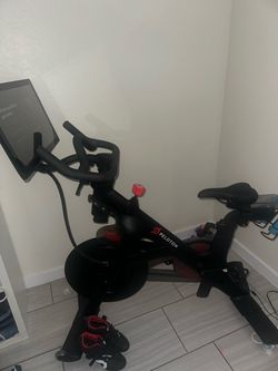Peloton bike and shoes