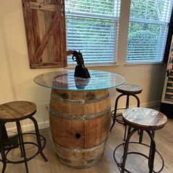 Wine Barrel  Table 36in. tempered glass top 3 stools  $300