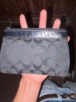 black Coach signature jacquard canvas wristlet