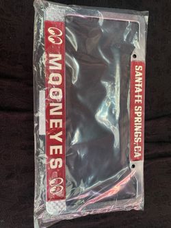 Moon eyes license plate
