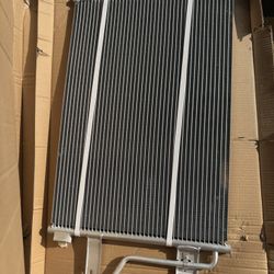 GPD 4983C A/C Condenser. This component is designed as an OE-style, direct-fit replacement for specific vehicles, primarily the 1 Dodge Ram 25