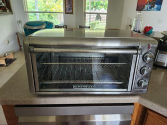 BLACK+DECKER Toaster Oven with Air Fryer, 8-Slice Capacity, 5 Cooking Functions, 60-Minute Timer.