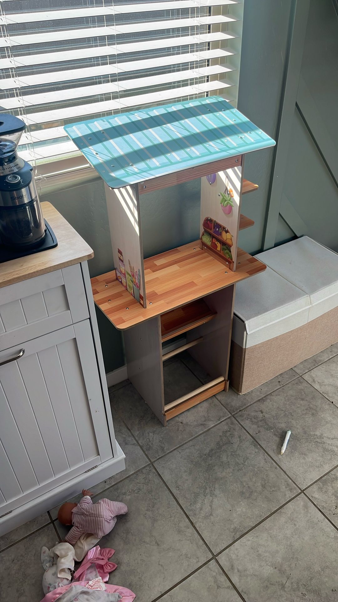 Wooden play market stand with storage made by KidsKraft. 