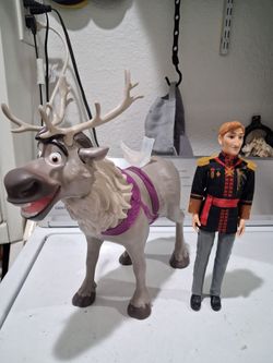 FROZEN King Angar doll 12 inches, and  Sven Reindeer ride.  Good condition.