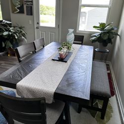 Dinning Room set Table , 4 chairs and a Bench with storage.