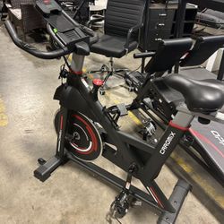 Caromix Exercise Bike Indoor Stationary Bike with Comfortable Seat Cushion, Monitor with Pulse & Ipad Mount for Home Cardio Gym with 300lbs Weight Cap