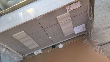 Light Wood Tone Dresser with Multiple Drawers