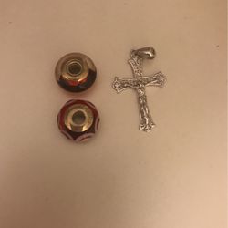 Two Pandora Charms and a Sterling Silver Cross For $35