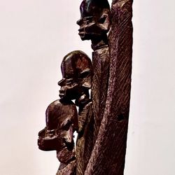 Rare vintage fine wood carved African sculpture Family with dimensions H18.5xW3 inch Lbs 1. Hand carved fine sculpture in hard wood Item# 289 Lbs 1