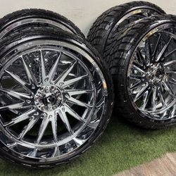 New 26x12 chrome tis wheels wrapped in 305/30r26 tires SAME AS A 33 