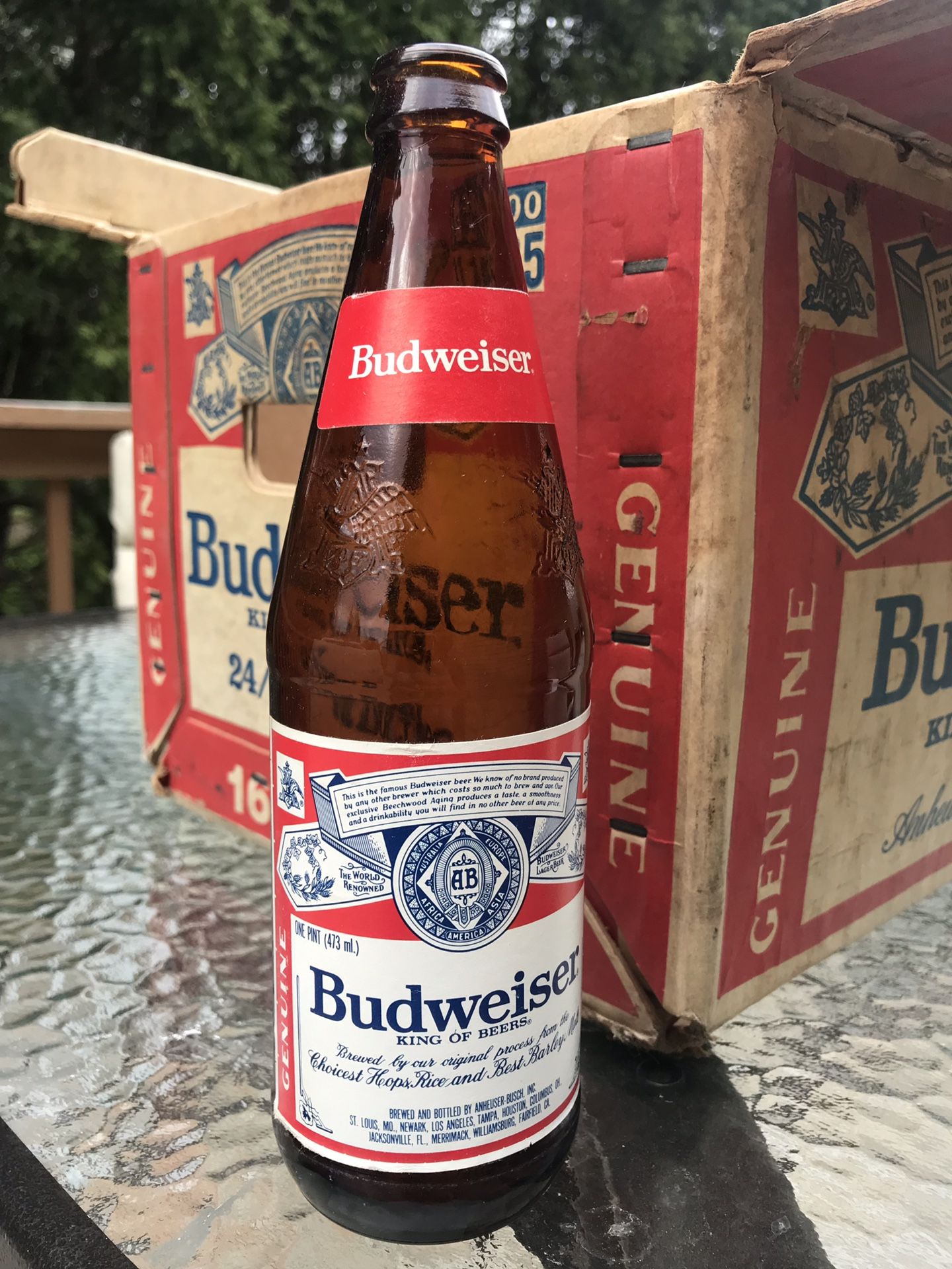 1980 Budweiser bottles with case.