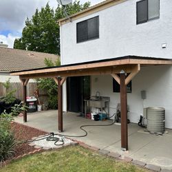CUSTOM SHEDS AND PATIOS COVERS 