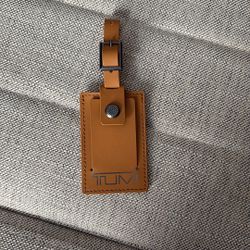 New TUMI Luggage Brown Leather Tag  With Silver Logo 