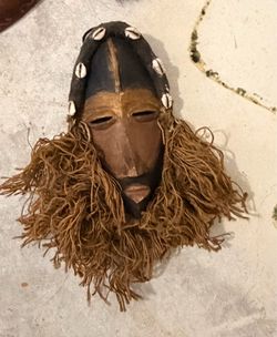 Handcrafted African Tribal Mask with Cowrie Shell Accents – 12” Wall Décor