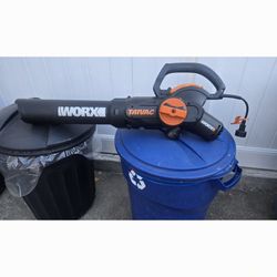WORX LEAF BLOWER AND MULCHES LEAVES