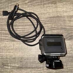 GoPro Hero w/ Case + Stand