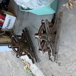 Heavy duty cast iron pulleys came from the historic pasadena play house they were used to lift scene 