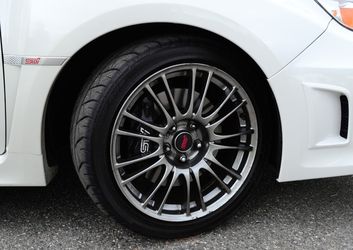 Subaru STI center caps set of (4)