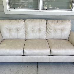 Cream Color Leather Sofa with 4 seats indoors or outdoors 