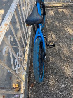 Blue BMX Bike with Black Tires and 4 pegs
