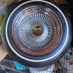1 New 100 Spoke 13" Rim With New Tire