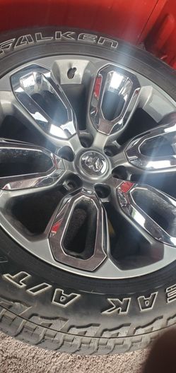 6 LUG 20 INCH WHEELS AND TIRES.
