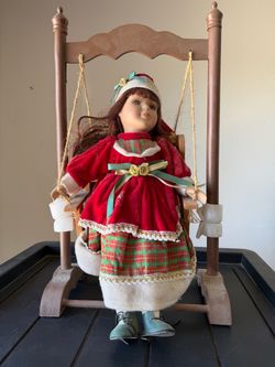 Doll on swing Collectible