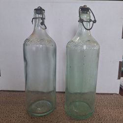 PAIR OF VINTAGE MOXIE SODA GLASS BOTTLES