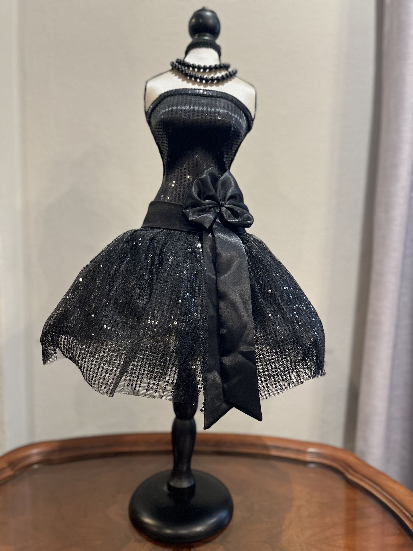 Black sequin corset top with lace up back and bow detail decoration or jewelry holder