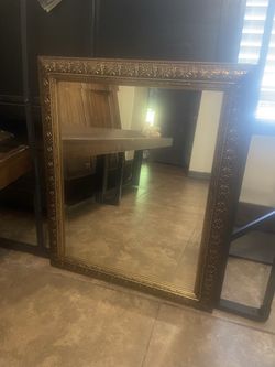 Gold mirror