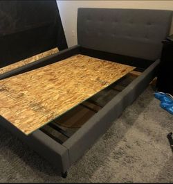 Like New Queen Size Gray Upholstered Bed Frame without the Plywood