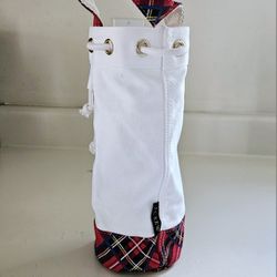 11" J Crew White Canvas Water Bottle Tote Carryall Bag with Red Tartan Bottom and Handle and Rope Tie Closure. 4" Wide. Pre-owned in excellent conditi