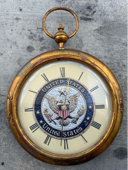 Vintage Great Seal United States All Seeing Eye Wall Hanging clock.  22”x15”. Dial is 12”.