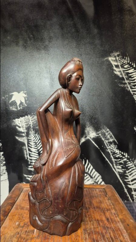 Partially Nude Female Woodcarving