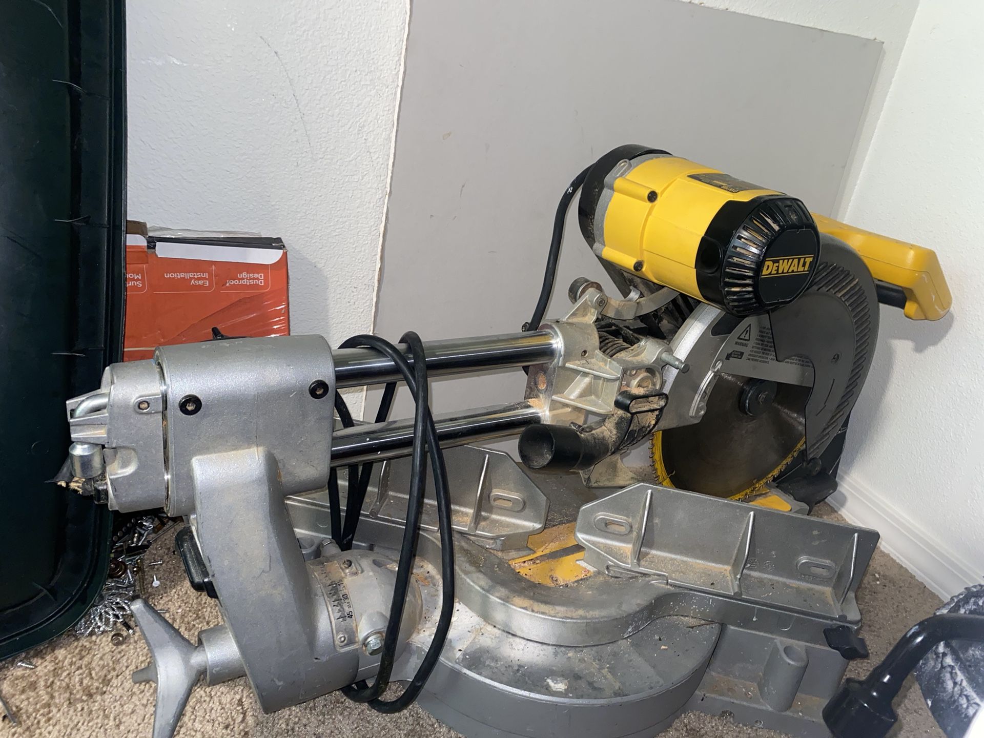 DeWalt DW708-LX Miter Saw, a 12-inch sliding compound miter saw