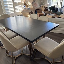 Black brown dining room table with 6 chairs