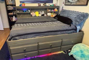 Full-size bookshelf bed with drawer storage