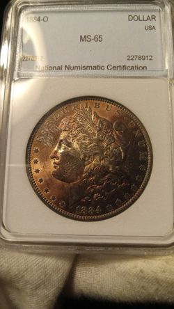 1884-O Morgan Silver Dollar NNC MS 65 New Orleans MintToned On Obverse 