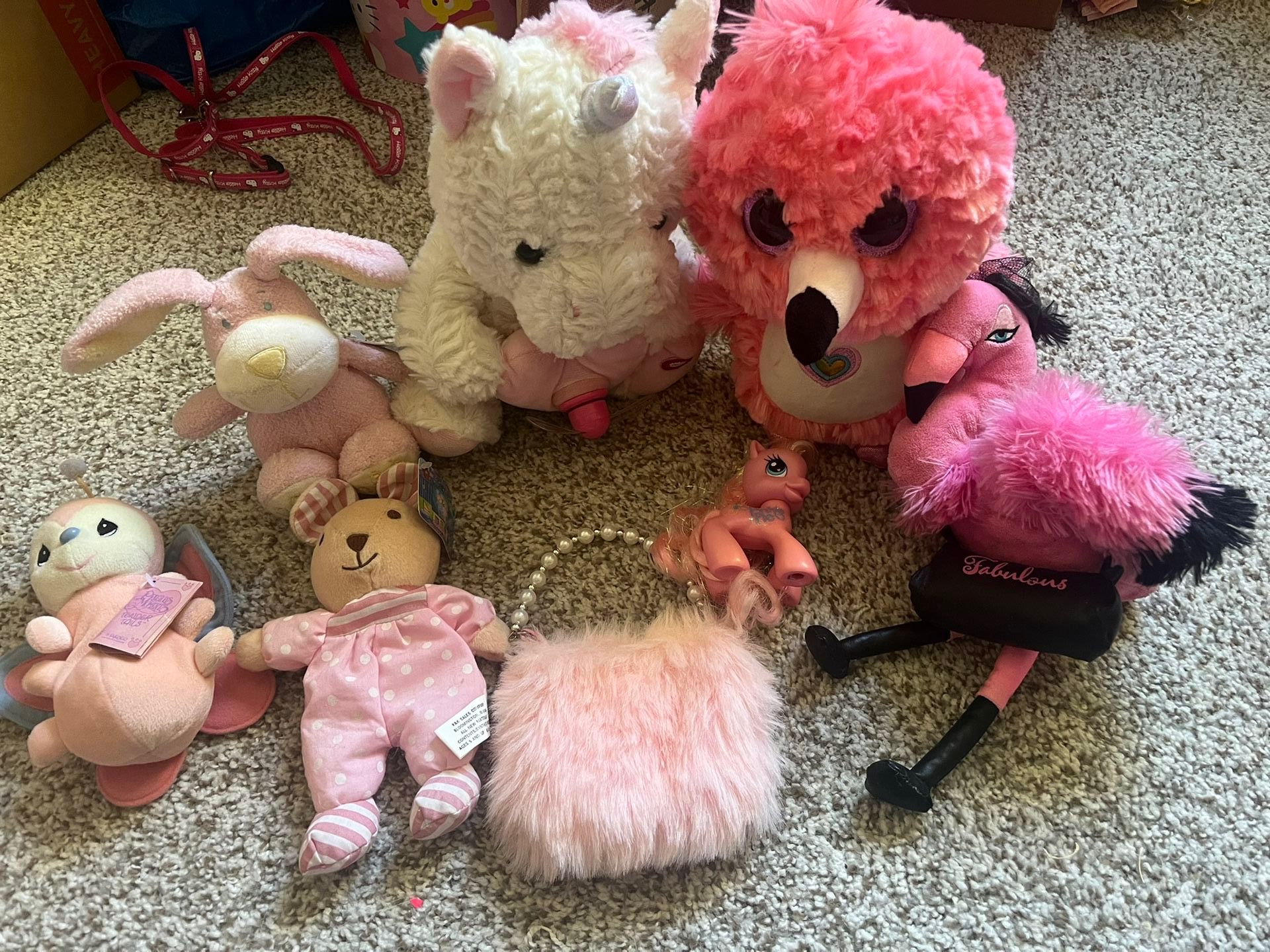 Lot Of Pink Stuffed Animals And Toys
