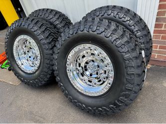 NEW 17x9 fittipaldi wheels mirror chrome wrapped in 35x12.50r17 atturo mt tires