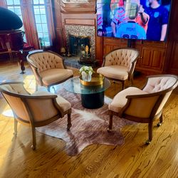 4 vintage barrel tufted chairs on casters