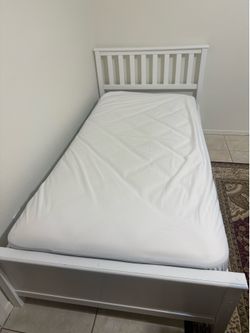 Twin bed frame and mattress