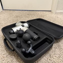 Hyperice Hypervolt massage gun with case and attachments