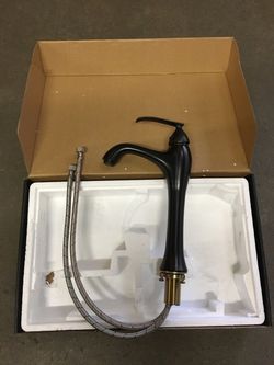 New in Box $25 oil rubbed bronze color single handle bathroom vessel faucet