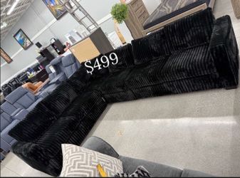 Large sectional sofa black fur-like jumbo corduroy