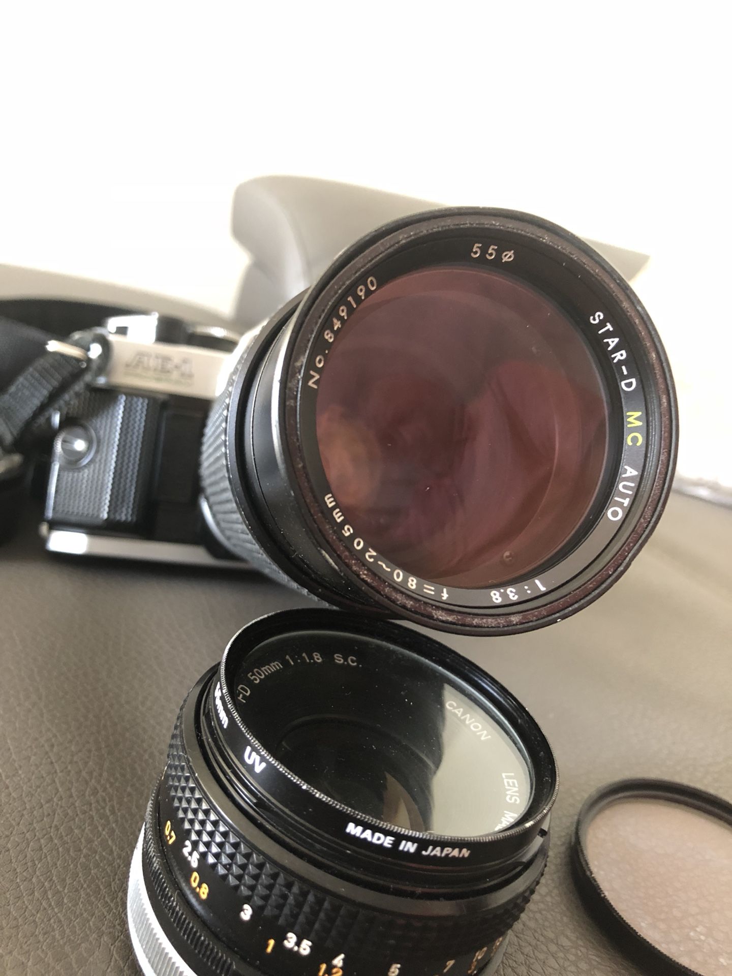 AE-1 Canon SLR Camera with lenses