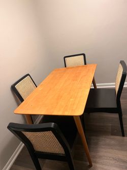 Wooden table, including all 4 chairs